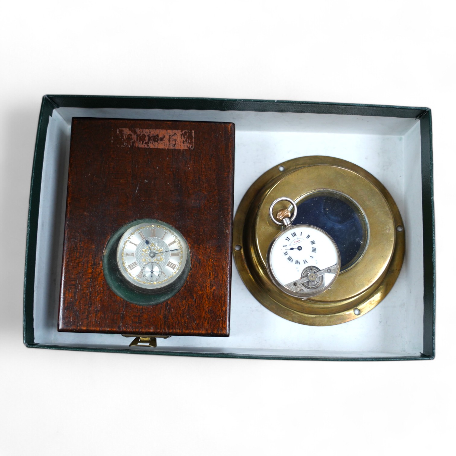 A George V silver Hebdomas eight day patent pocket watch, a late Victorian silver open face pocket watch and two watch cases. Condition - poor to fair